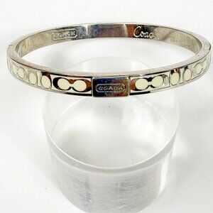 Coach Silver Tone Cream Enamel Signature Bangle Bracelet